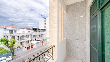 Deluxe Quadruple Room, Balcony | Balcony