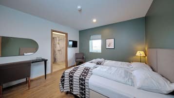 Chambre Triple Confort | Bureau, Wi-Fi gratuit, draps fournis