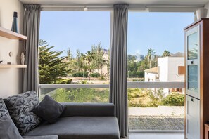 TV, DVD player, stereo - Holiday Apartment Llenaire cerca playa with Mountain View, Shared Pool & Wi-Fi (Port de Pollença)