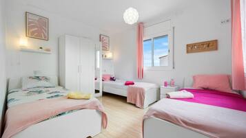 4 dormitorios, tabla de planchar con plancha, wifi gratis y ropa de cama