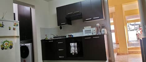 Apartment | Private kitchen | Fridge, microwave, oven, stovetop