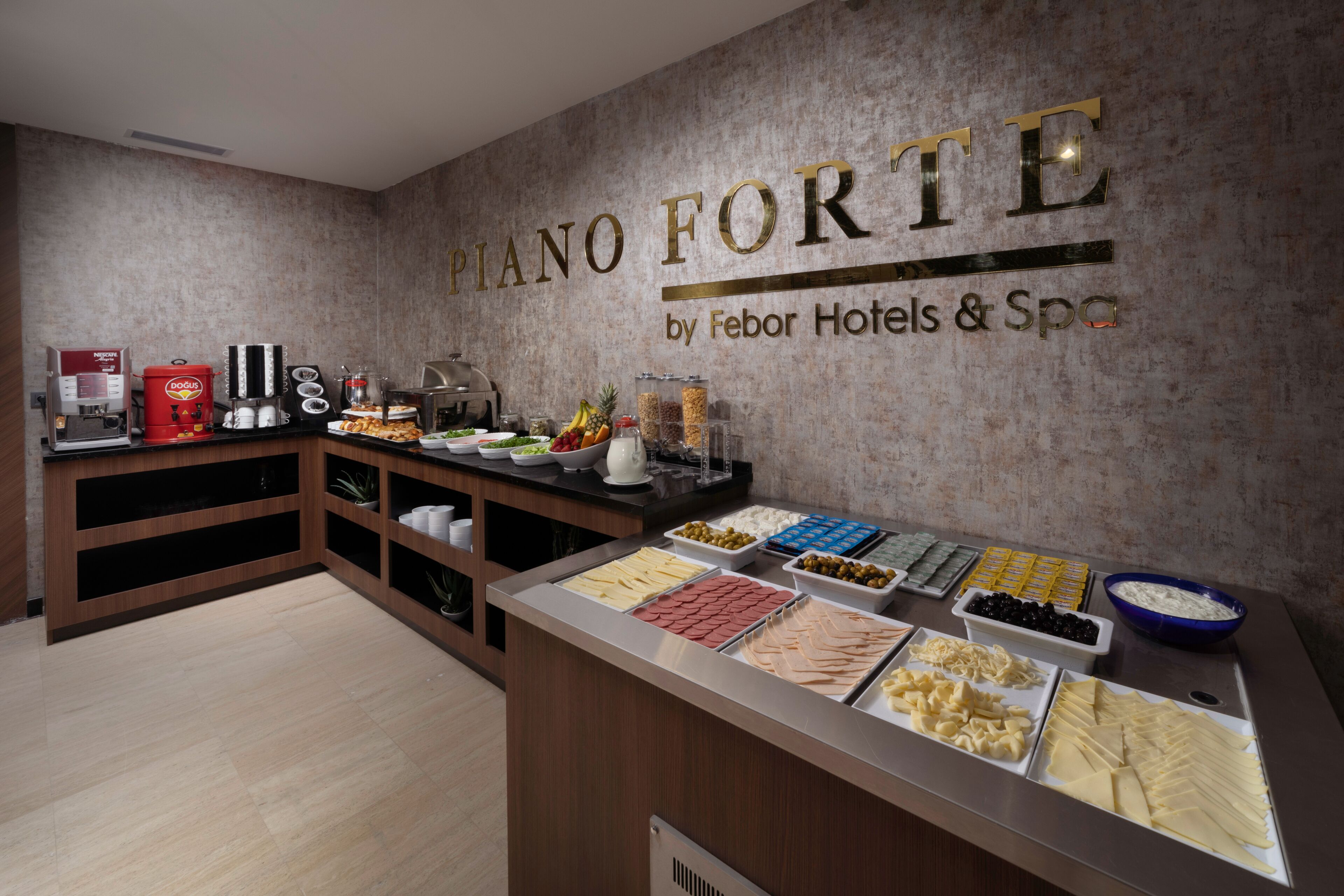A buffet area with various food options and a coffee station.