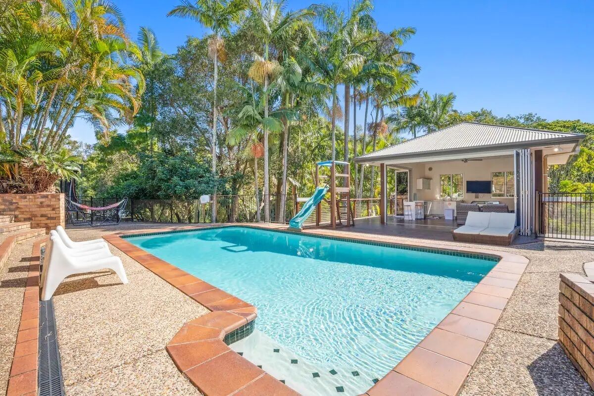 Paradise Retreat Resort Home with Waterfall & Pool