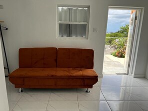 Living area - New  studio  apartment, ocean view, 10 mins or less to beach,7 mins to Airport. (Basseterre  , St.Peters)