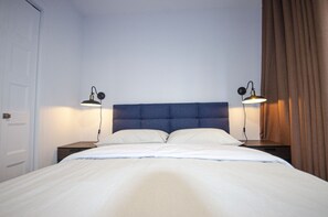 1 bedroom, desk, iron/ironing board, travel cot