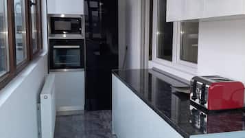 Apartment | Private kitchen | Fridge, microwave, oven, stovetop