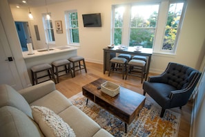 32-inch flat-screen TV with digital channels, TV, Hulu - Woodley Suites & Residences (Washington)