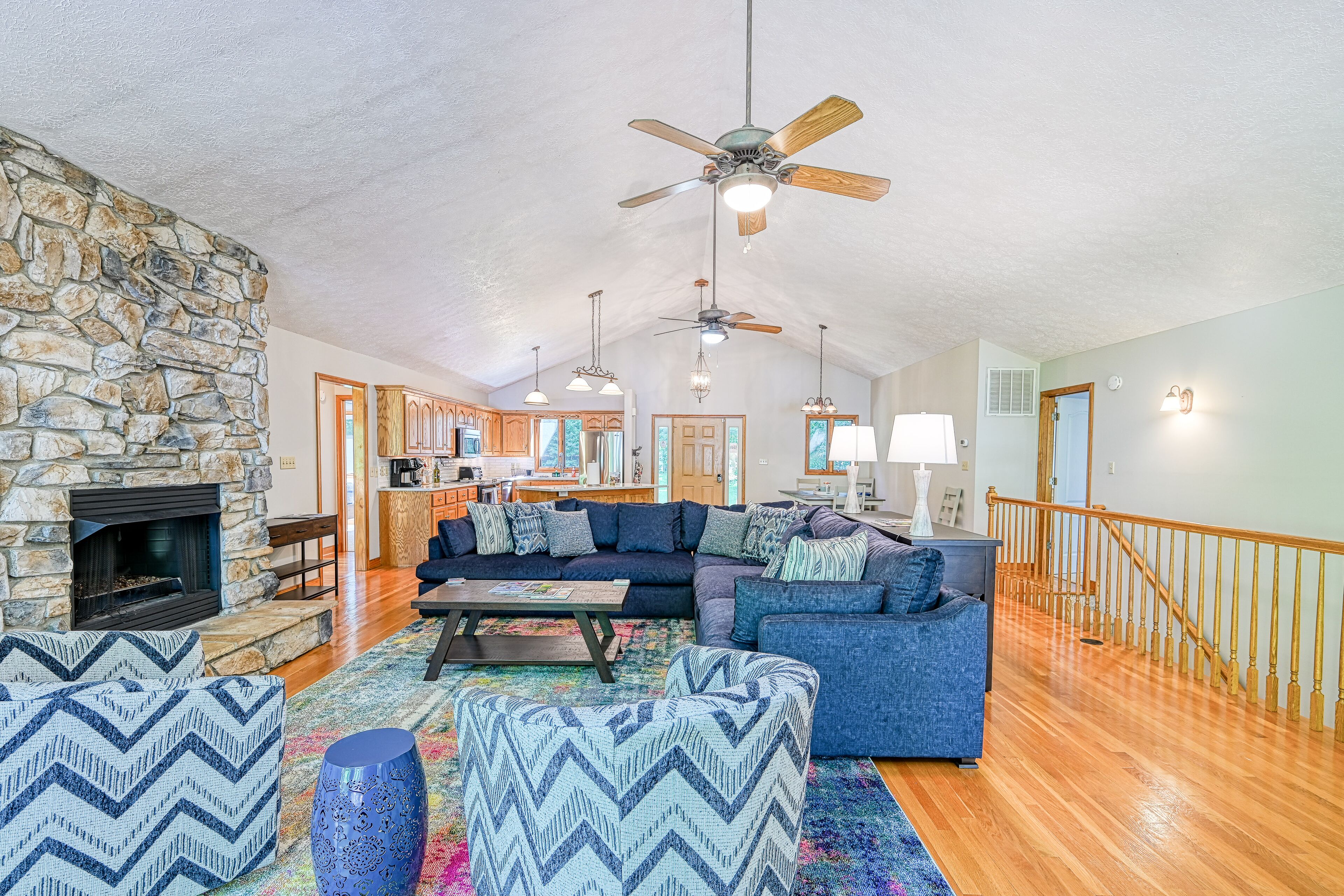 Lakefront home with deck, hot tub, game room, kayaks, & fireplace