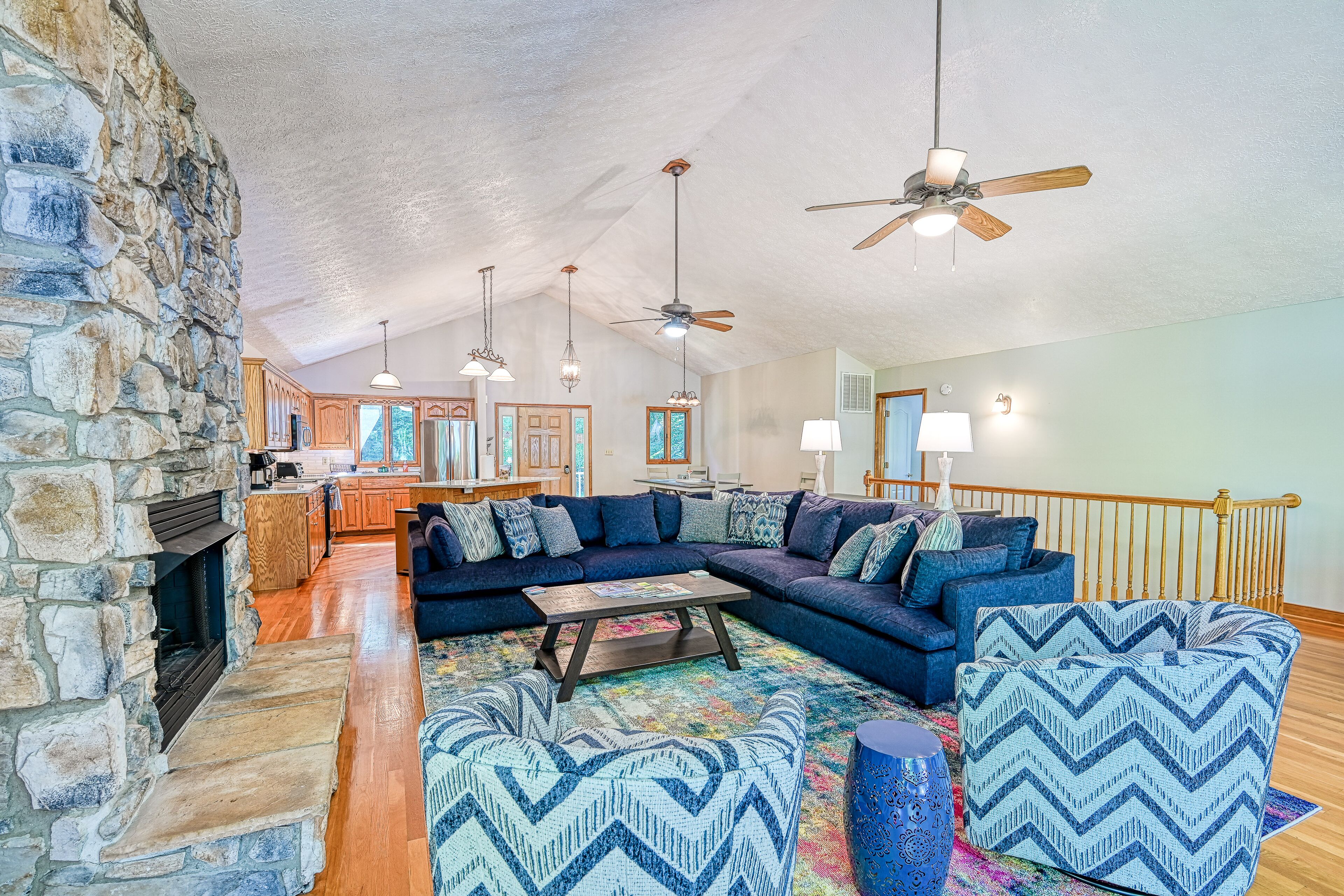 Lakefront home with deck, hot tub, game room, kayaks, & fireplace