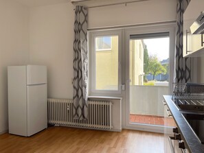 舒适公寓, 多张床 | 私人厨房 | 冰箱、微波炉、炉灶、烤面包机