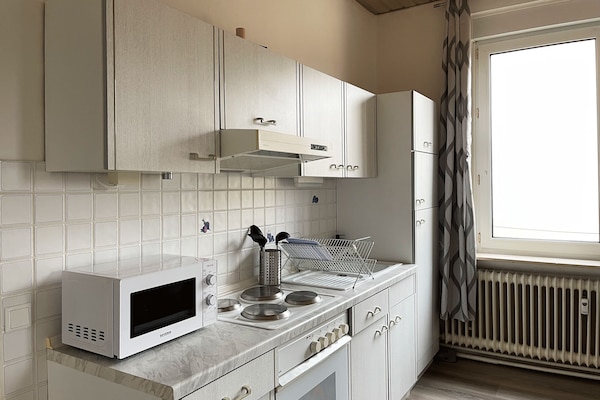 Departamento económico | Cocina privada | Refrigerador, microondas, parrilla de estufa y tostadora