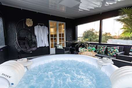 Outdoor spa tub. Dynasty Home spa