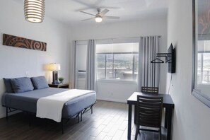 1 bedroom, desk, iron/ironing board, travel cot