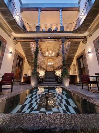 Interior entrance. Milo Collection Hotel