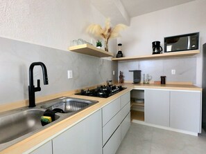 Fridge, microwave, coffee/tea maker, blender