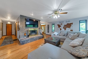 Smart TV, fireplace, books