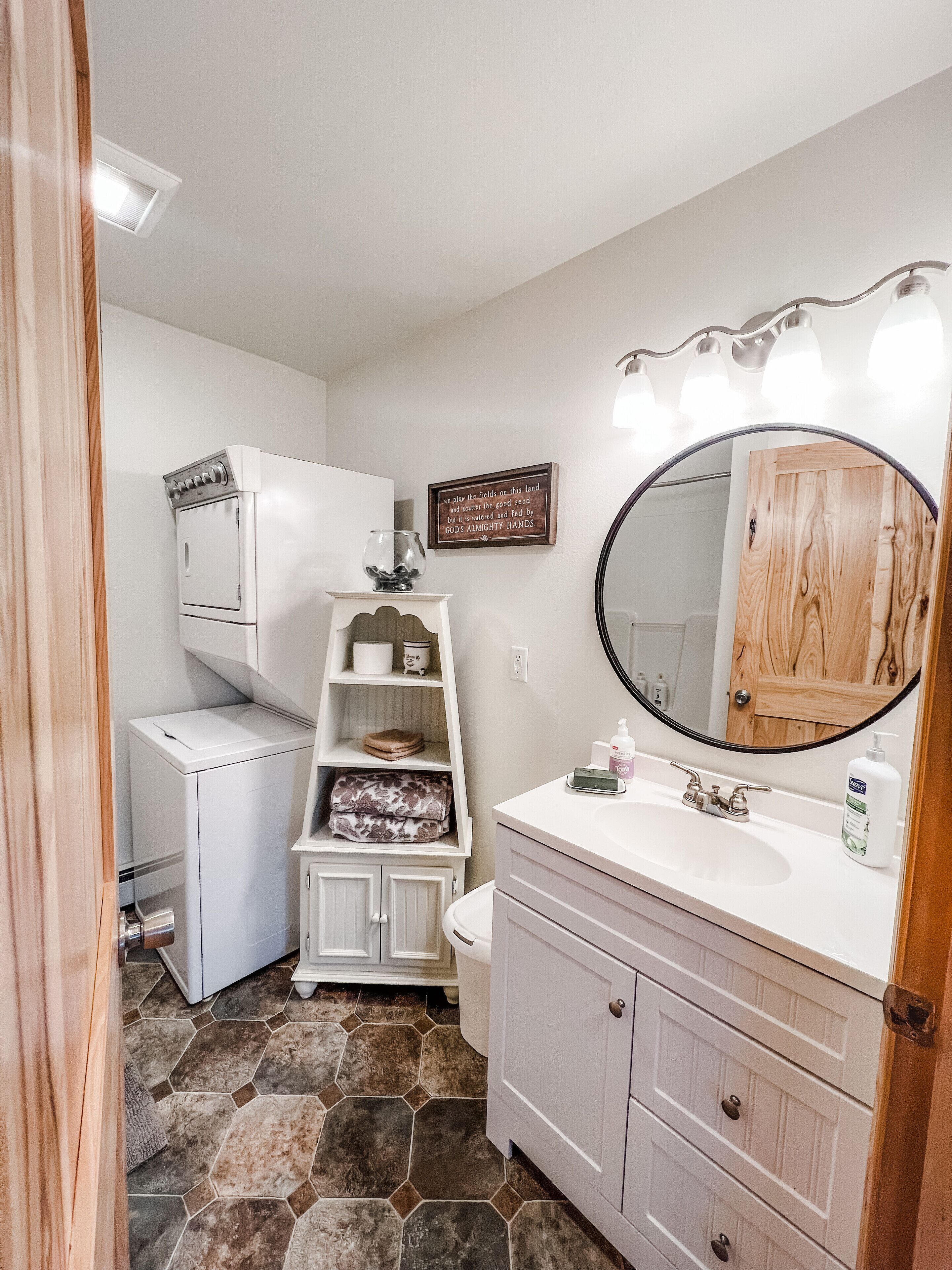 Bathtub, hair dryer, towels, soap