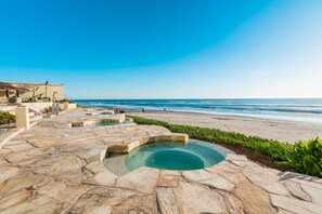 On the beach, sun loungers, beach towels