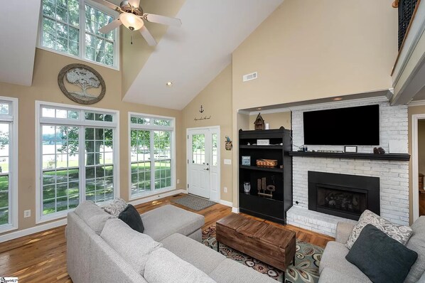 Smart TV, fireplace, books