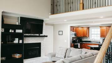 Smart TV, fireplace, books