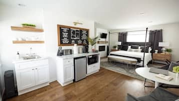 1 bedroom, desk, iron/ironing board, travel crib