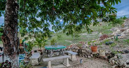 Scenic hilltop studio with shared plunge pool, kitchenette, AC, & WiFi