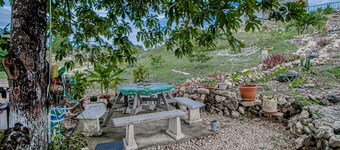 Scenic hilltop studio with shared plunge pool, kitchenette, AC, & WiFi