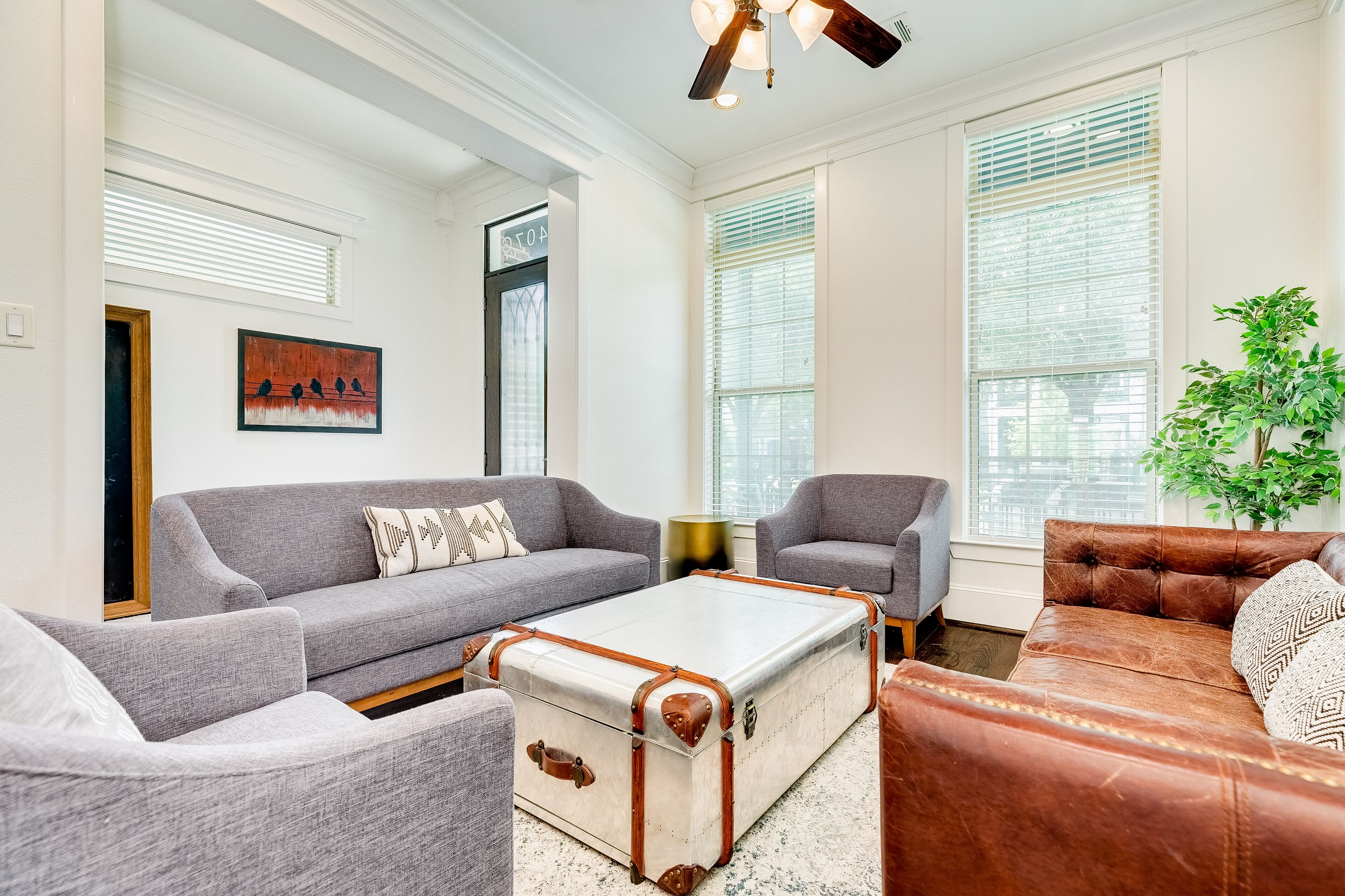 Stylish, two-story townhouse with enclosed yard, washer/dryer, & AC