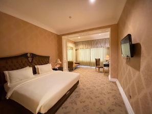 Deluxe Room | Desk, laptop workspace, free WiFi, bed sheets - GRAND EMPIRE PALACE HOTEL (Surabaya)