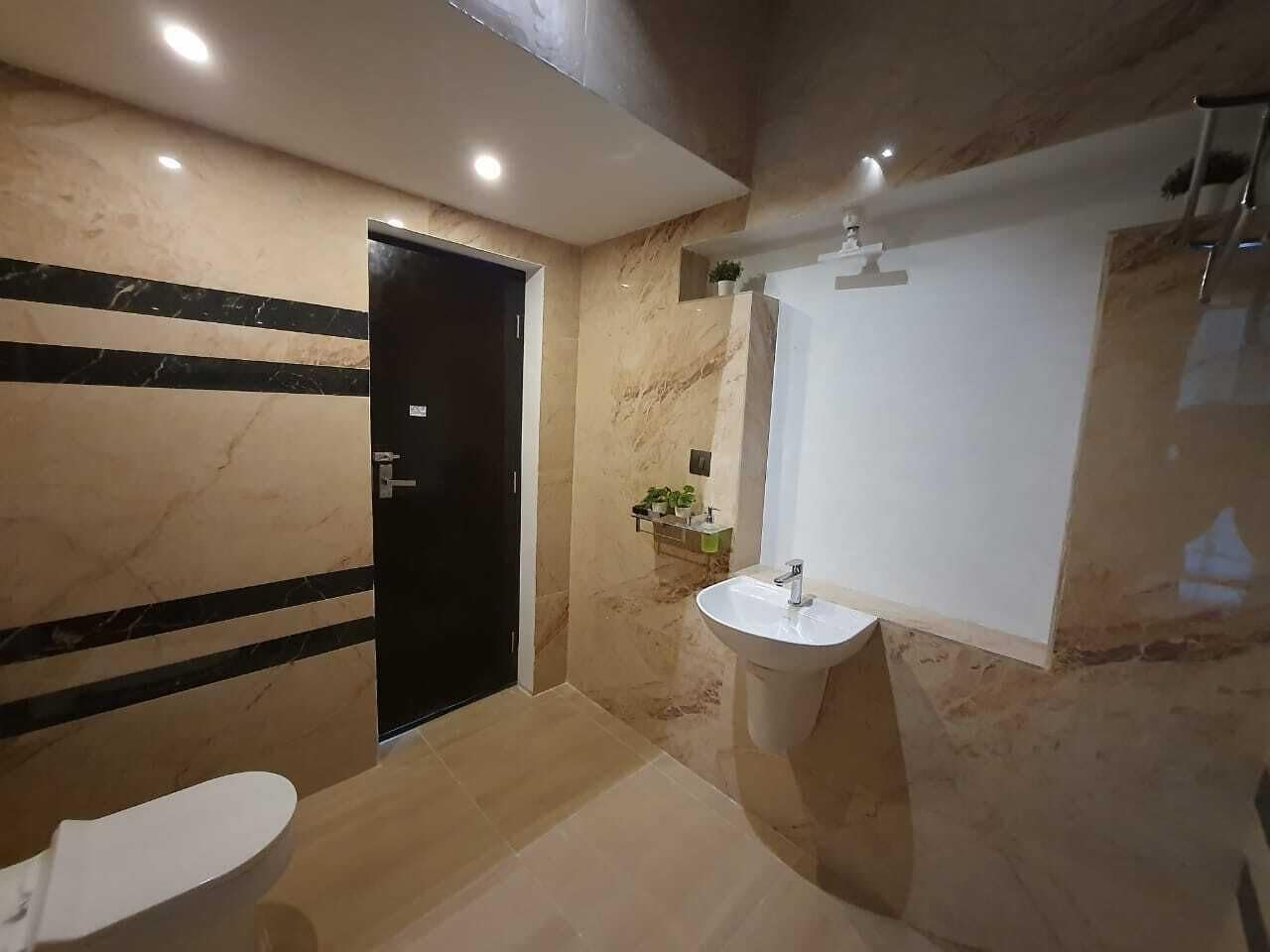 Shower, towels, soap, toilet paper