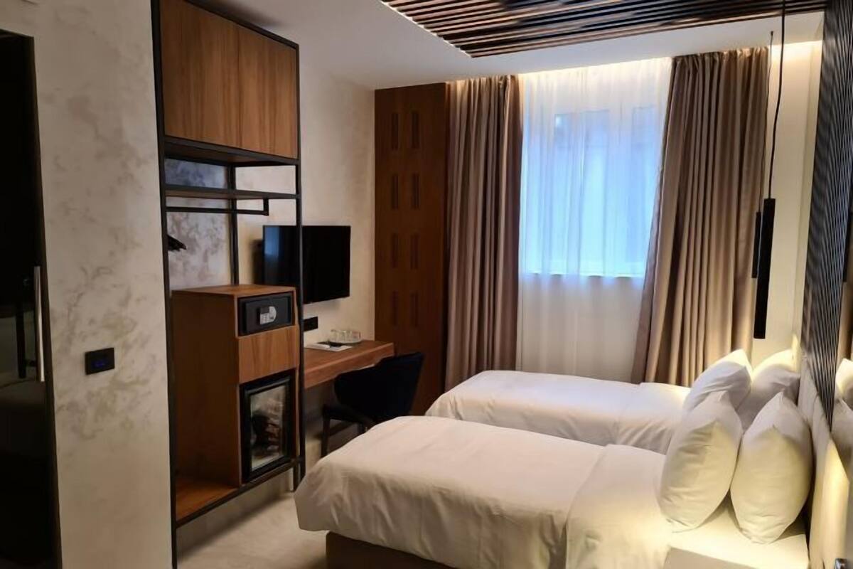 1 Schlafzimmer, hochwertige Bettwaren, Minibar, Zimmersafe