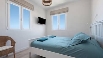 2 dormitorios, tabla de planchar con plancha, wifi gratis y ropa de cama