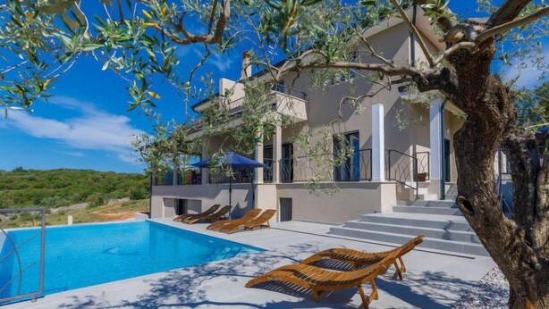 A modern villa with a pool, outdoor seating, and a view of the landscape. - Villa Bella by Interhome (Novigrad (Istra))