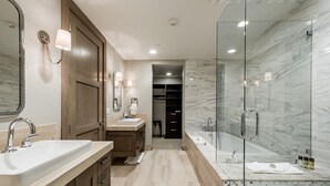 A modern bathroom with two sinks, a glass-enclosed shower, and a walk-in closet. - Premium Junior Three Bedroom 3 Apartment Hotel by Redawning (Park City)