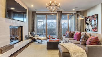 Suite, 2 Bedrooms | Living room | Fireplace