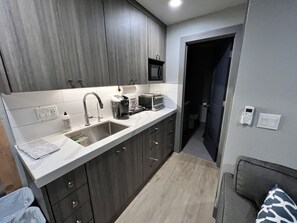 Fridge, microwave, coffee/tea maker, electric kettle