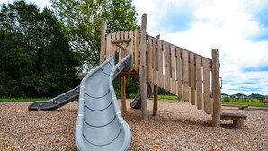 A playground with a slide and climbing structure. - HS#1- Modern Studio next to Premier Sports Complex (Bradenton)
