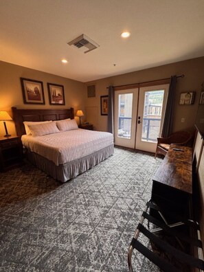 1 habitación, tabla de planchar con plancha y cuna de viaje 