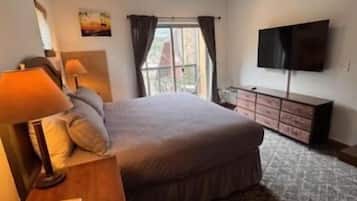 1 bedroom, desk, iron/ironing board, travel cot