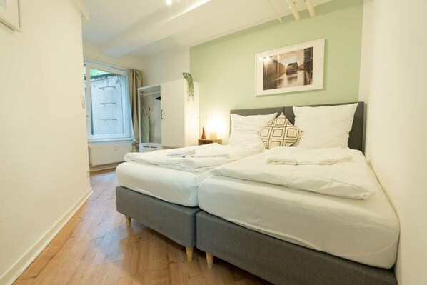 1 habitación, tabla de planchar con plancha, wifi y ropa de cama 