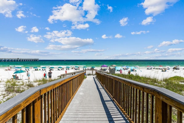 On the beach, sun-loungers, beach towels