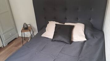 1 bedroom, desk, iron/ironing board, travel crib