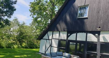 Romantic thatched-roof house with wellness area near the dyke