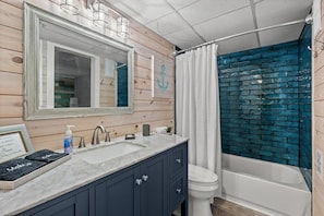 Bathtub, hair dryer, towels