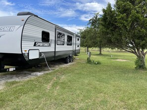 Experience the great outdoors in a SPORTSMEN RV, perfect for adventure seekers.