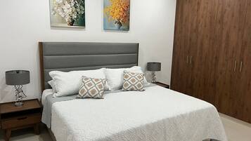 2 bedrooms, desk, iron/ironing board, travel crib