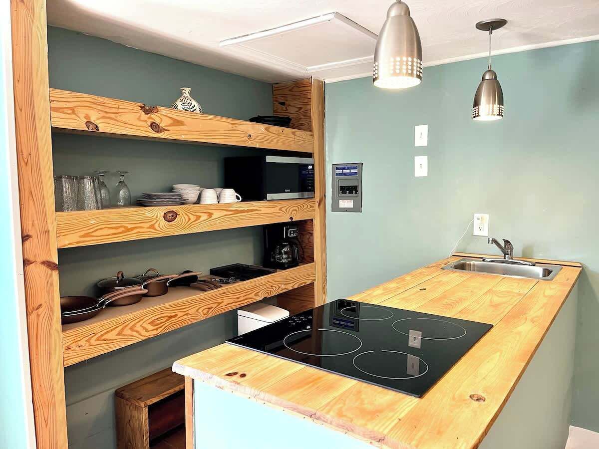 Fridge, microwave, stovetop, coffee/tea maker