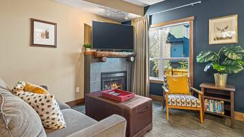 Smart TV, fireplace, DVD player, books