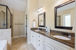 Bathtub, hair dryer, towels, soap