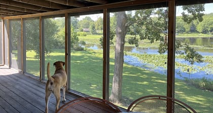 Relax at Grandma’s house with a screened in porch overlooking a private lake!